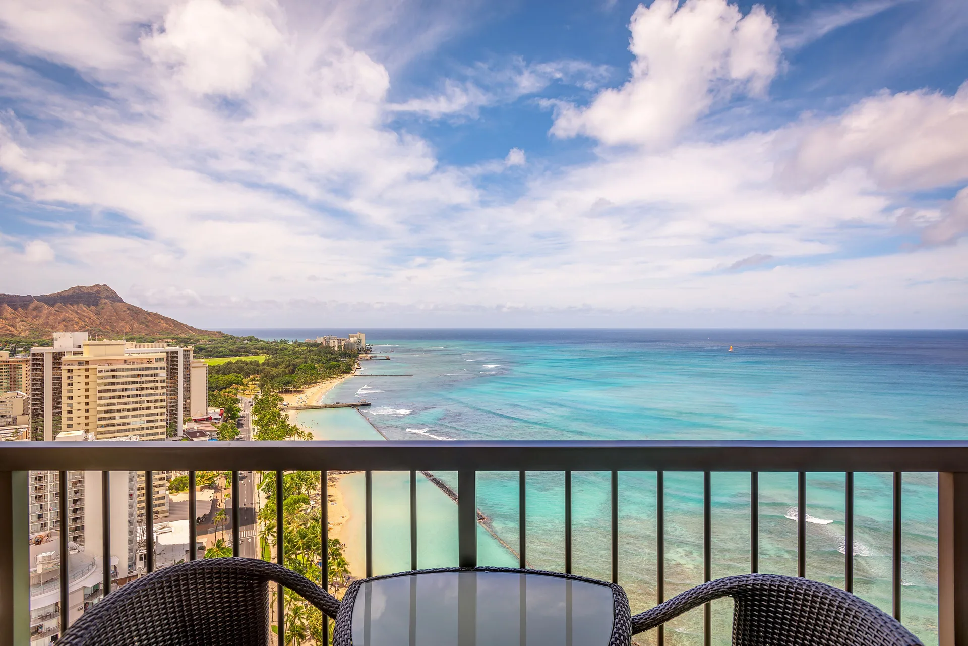Oceanfront balcony with Waikiki and Diamond Head views at Hyatt Regency Waikiki Beach Resort & Spa.