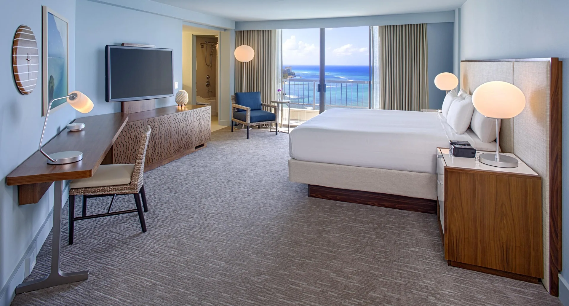 King oceanfront guest room with balcony view at Hyatt Regency Waikiki Beach Resort & Spa.