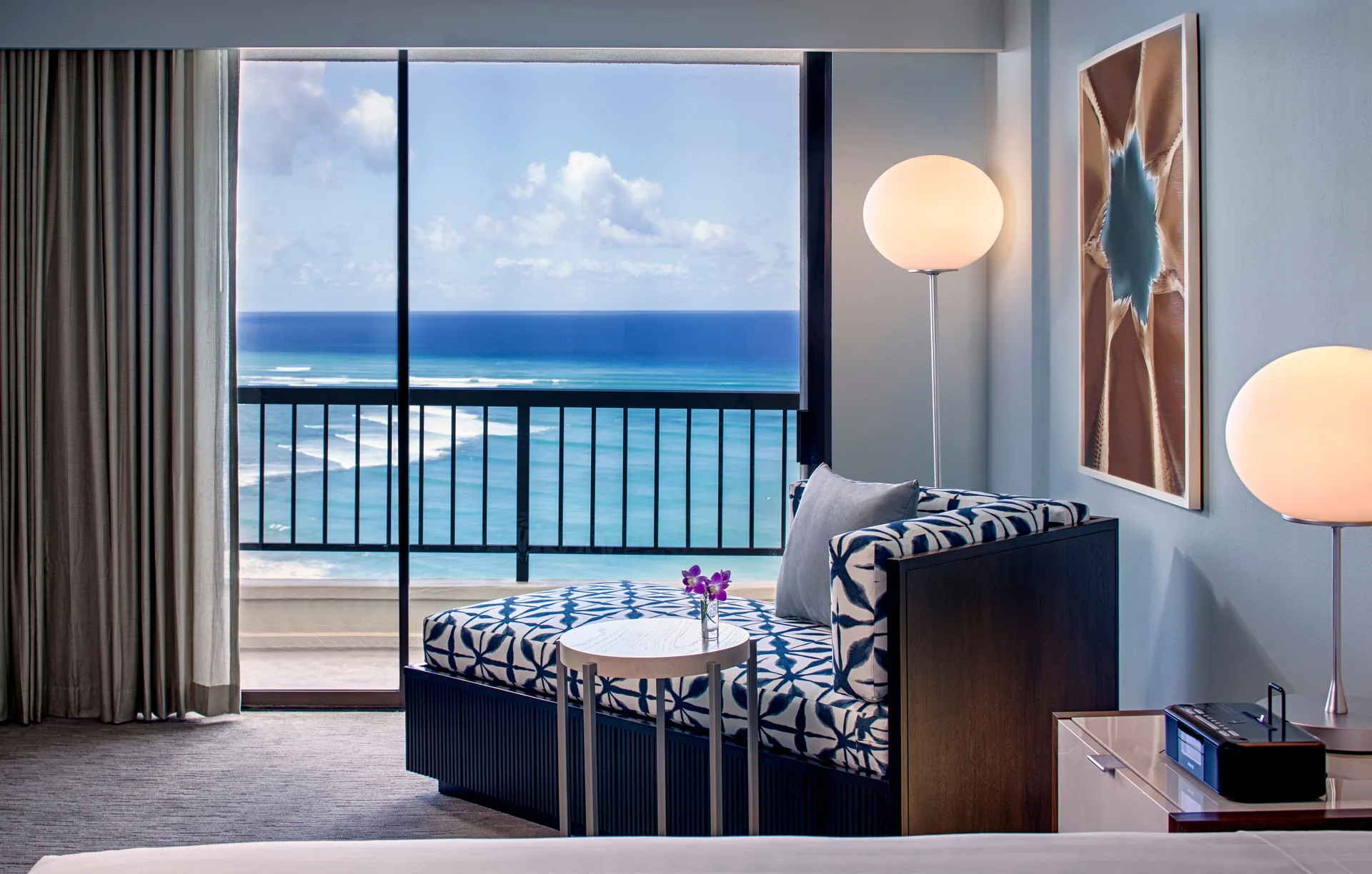 Oceanfront room sitting area and balcony view at Hyatt Regency Waikiki Beach Resort & Spa.