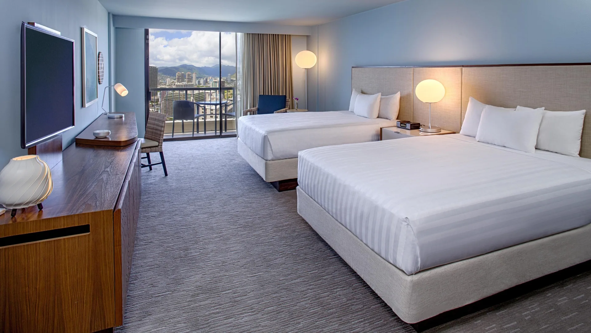 Waikiki View room with two queen beds at Hyatt Regency Waikiki Beach Resort & Spa.