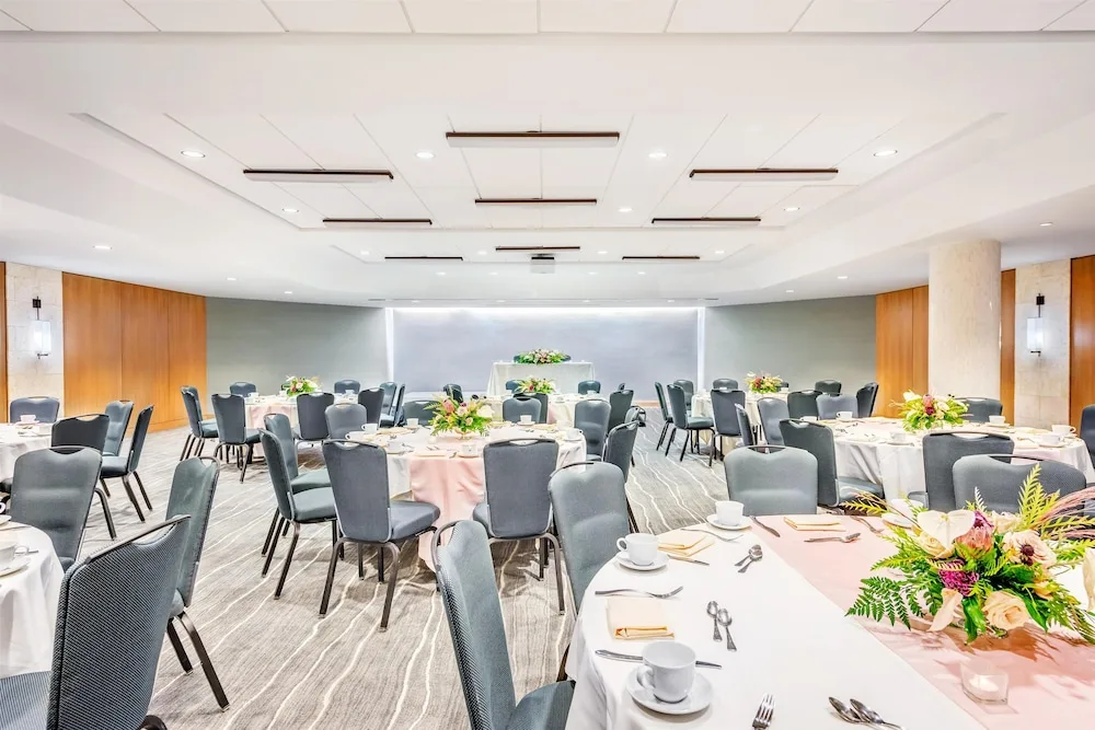 Formal banquet setup with floral centerpieces at Hyatt Regency Waikiki Beach Resort & Spa.