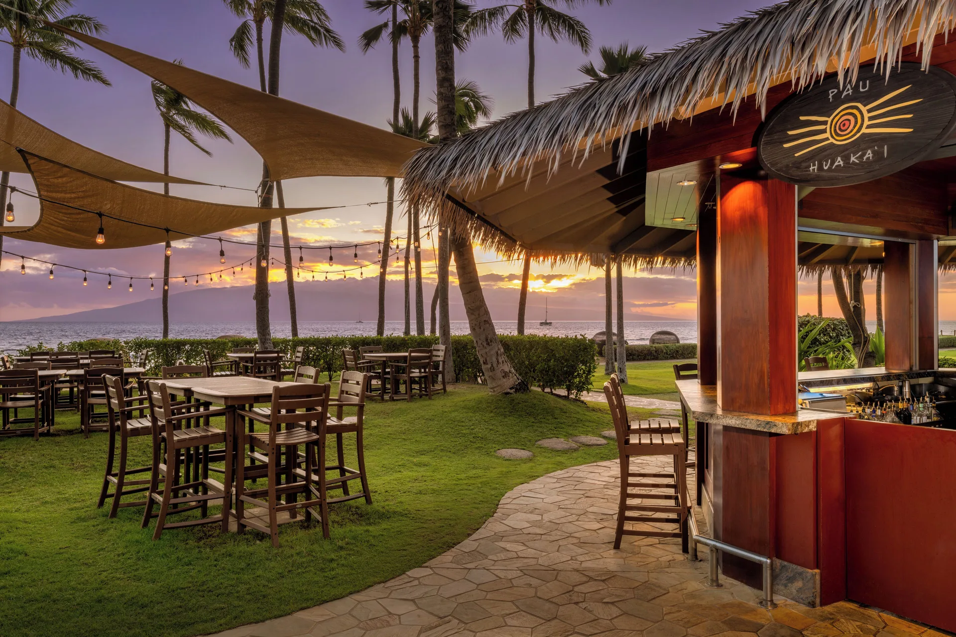 Pau Huaka'i Tiki Bar patio at sunset at Hyatt Vacation Club at Ka'anapali Beach.