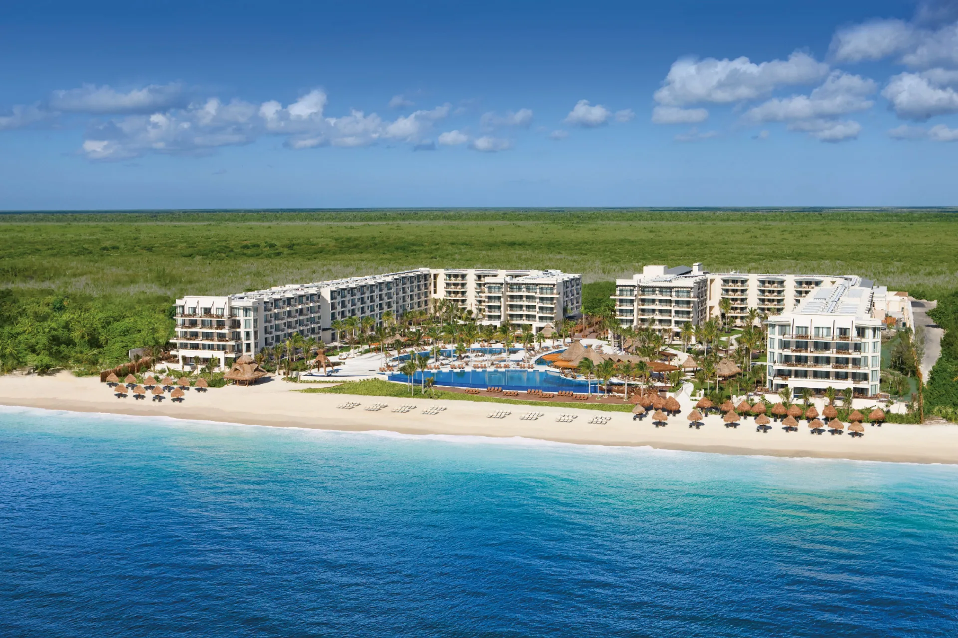 Dreams Riviera Cancun Resort & Spa family all-inclusive beachfront resort with pools and spa