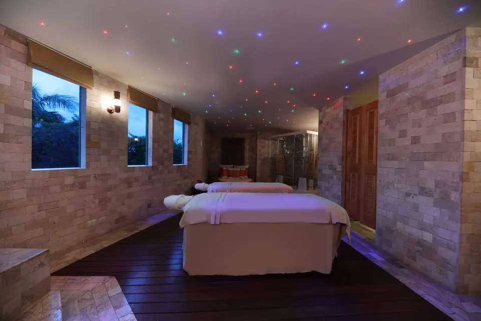 Spa treatment room with two massage beds at JOIA Paraíso by Iberostar.
