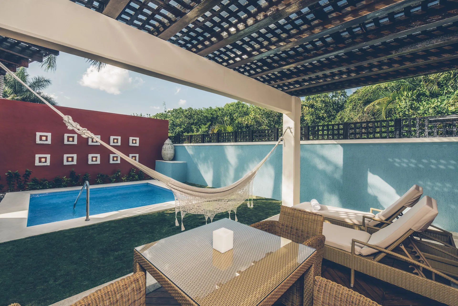 Romantic Villa shaded patio with hammock and private pool at JOIA Paraíso by Iberostar.