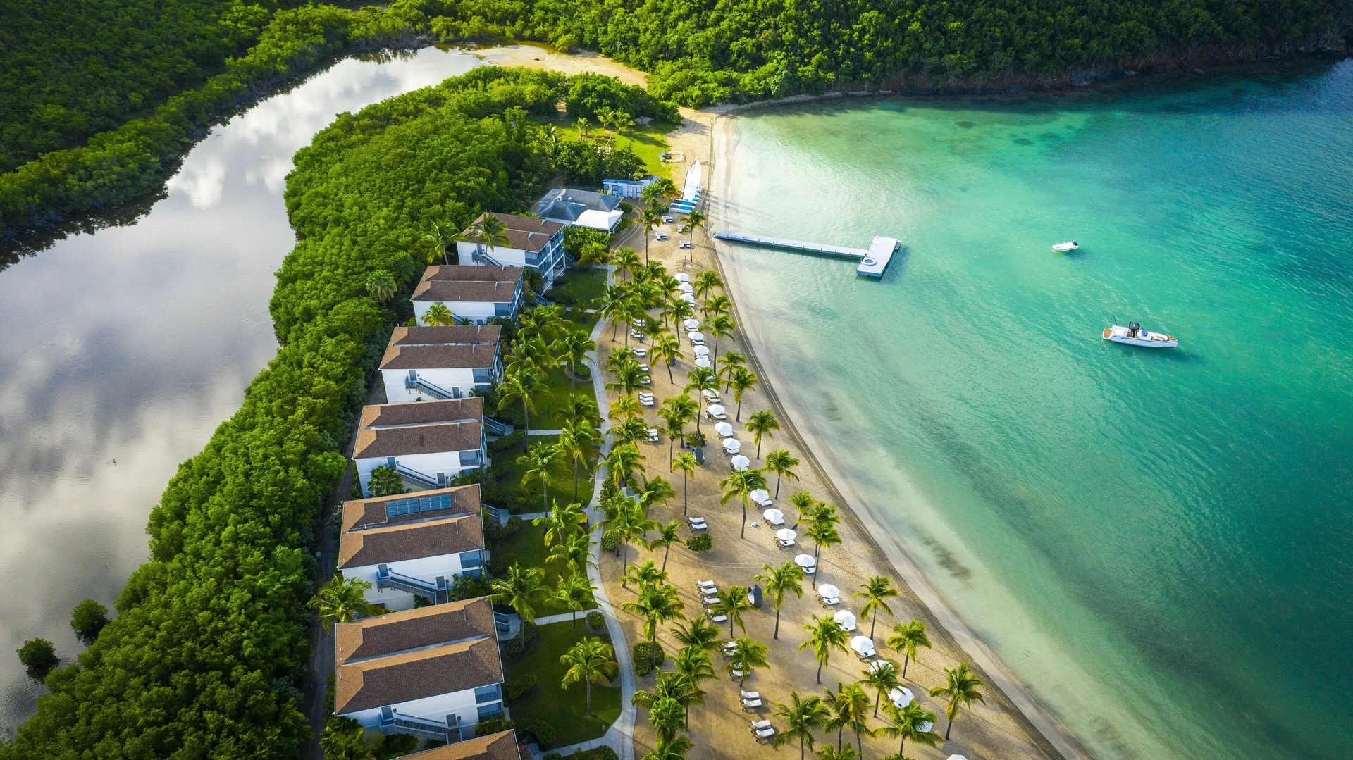 Carlisle Bay luxury resort with calm beachfront, spacious suites and refined family-friendly style