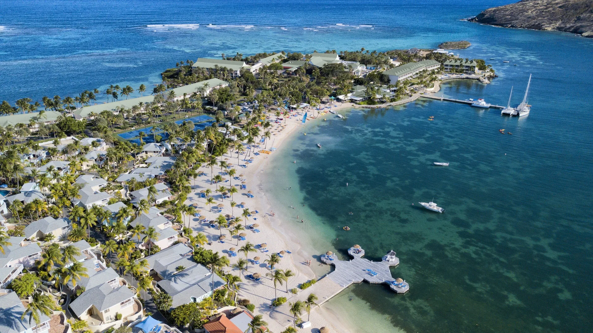 St. James's Club Antigua resort on private peninsula with dual beaches and tropical grounds in Antigua.