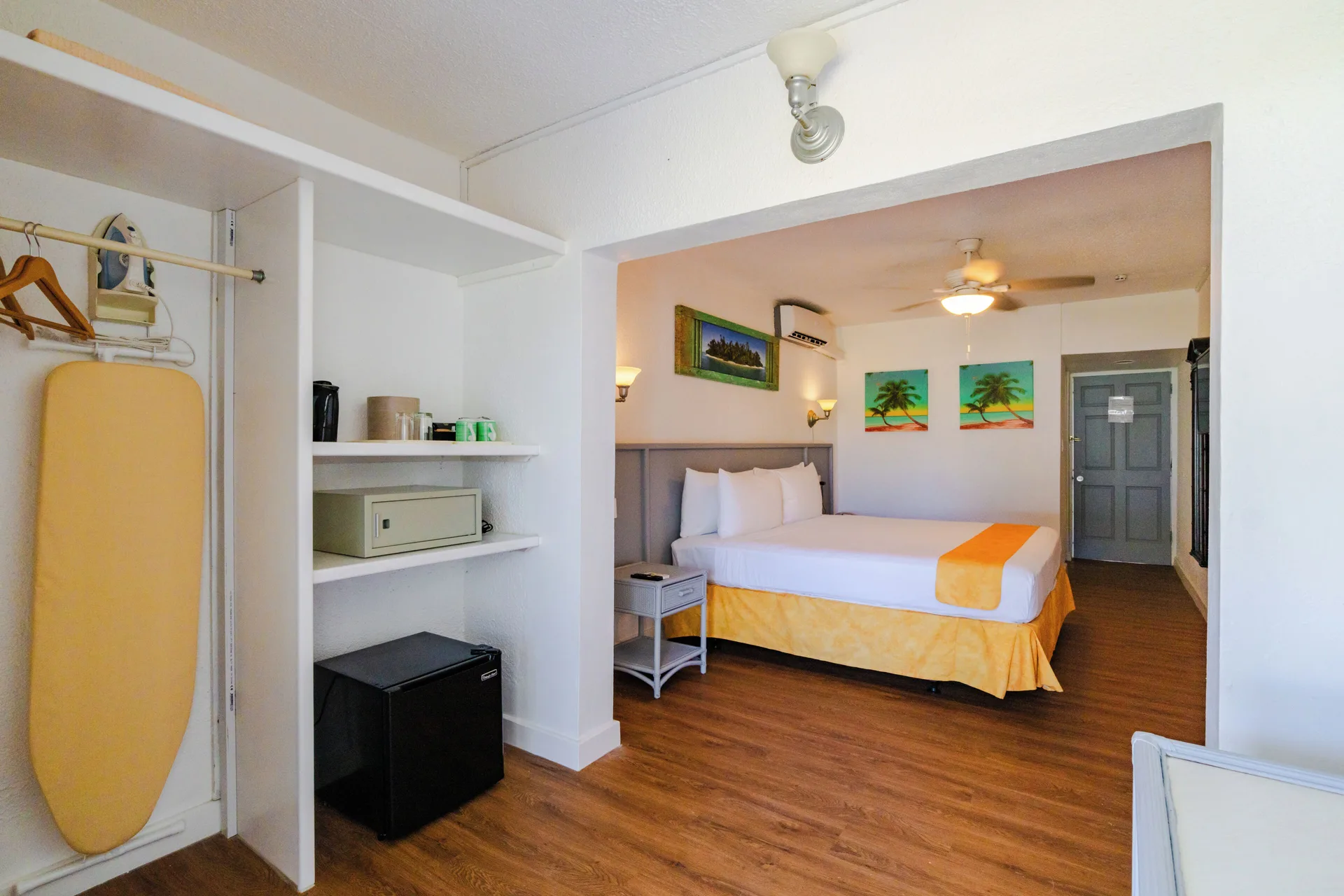Superior Room with king bed and open storage at Jolly Beach Antigua.