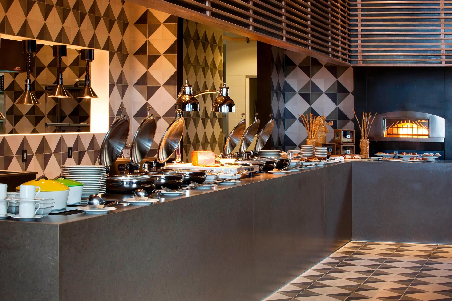 Breakfast buffet counter with chafing dishes at JW Marriott Los Cabos Beach Resort & Spa.