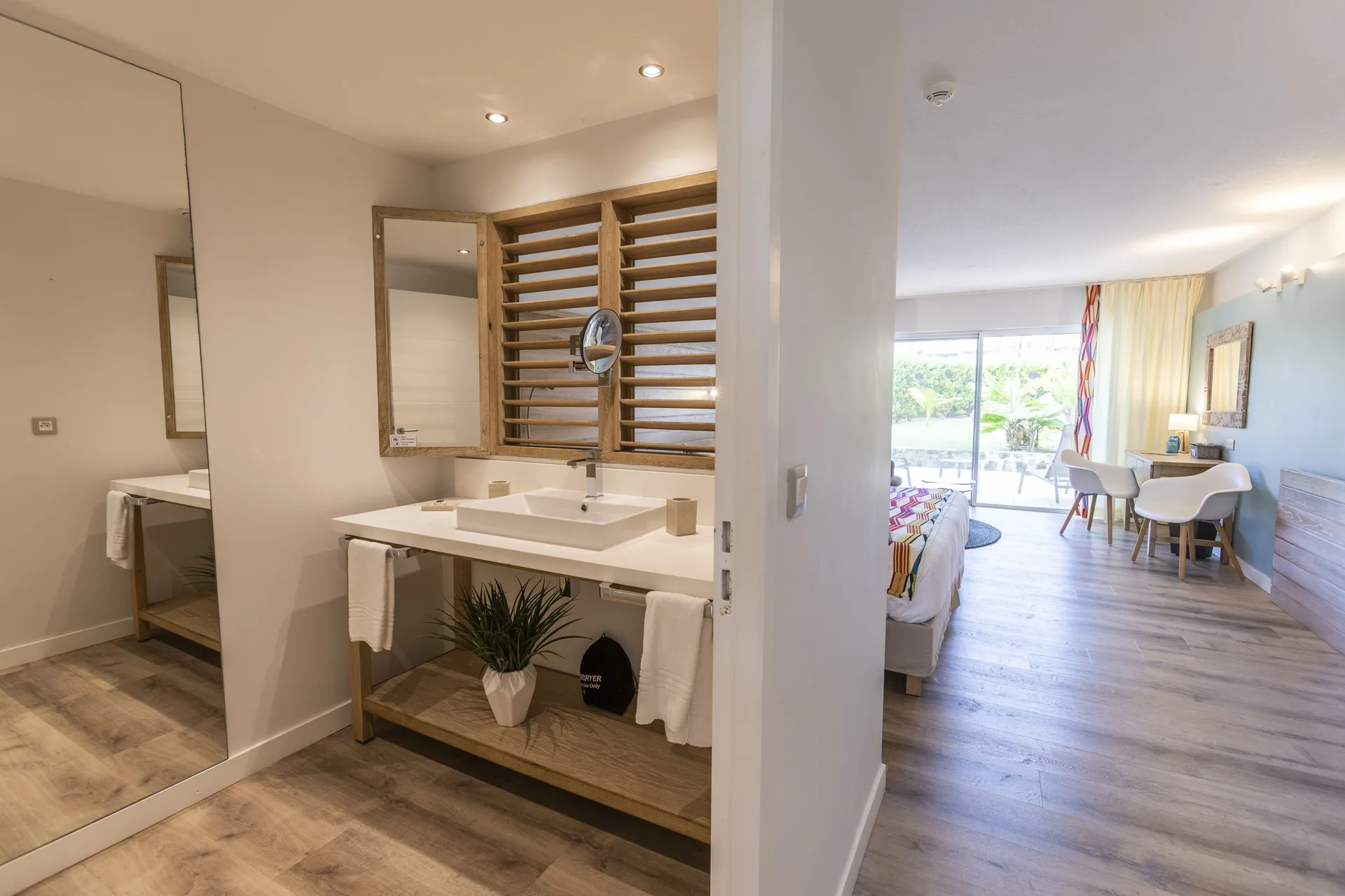 Junior Suite Kitchen Premium Garden vanity and bedroom view at La Playa Orient Bay.