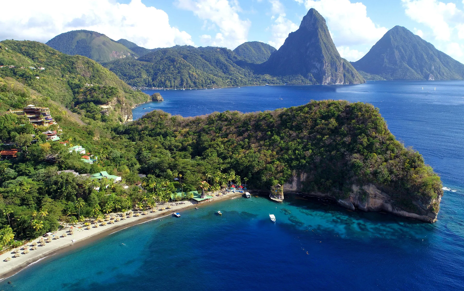 Anse Chastanet Resort beachfront property in St. Lucia with tropical hillside rooms, coral reef access, and dive center.