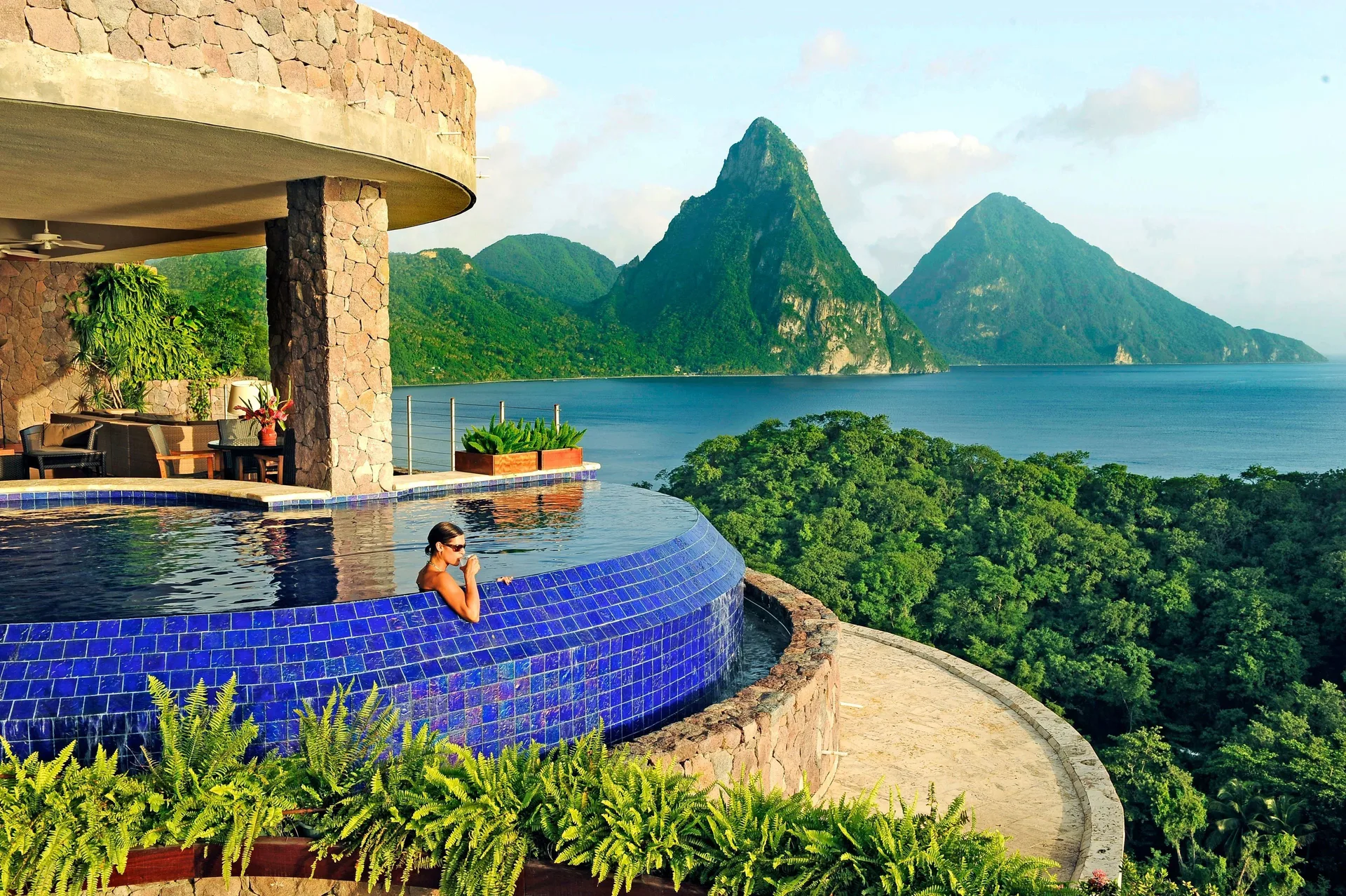 Jade Mountain Resort luxury sanctuary suites in St. Lucia with infinity pools, open fourth walls, and panoramic Piton and Caribbean views.