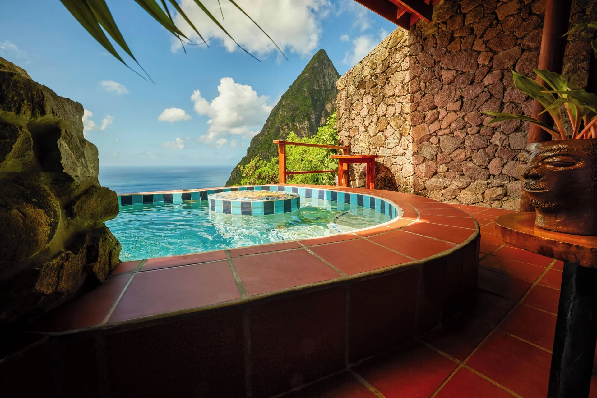Private plunge pool with Piton and sea views in the Gros Piton Suite at Ladera Resort.