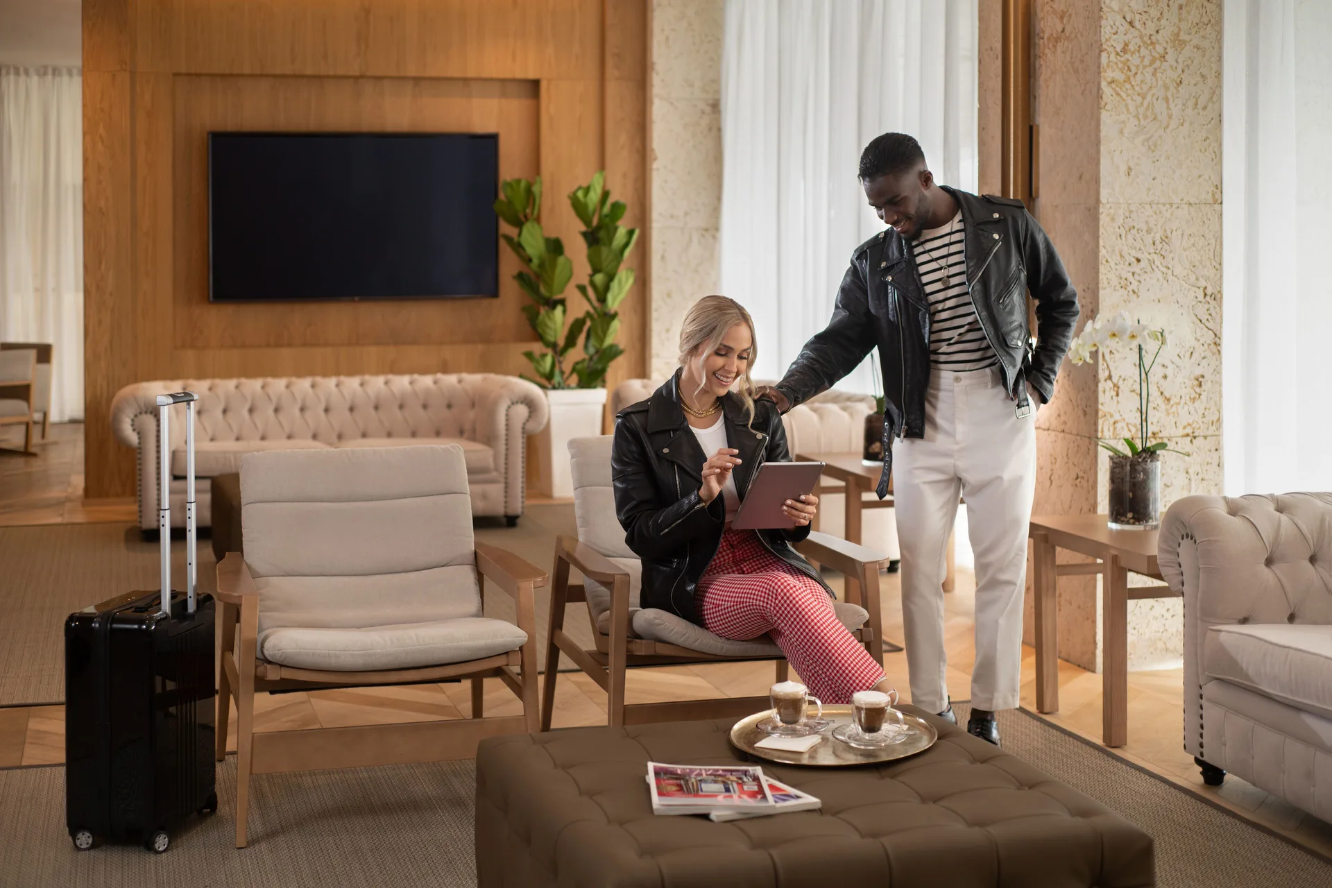 Guests seated in the lobby lounge at Live Aqua Punta Cana.
