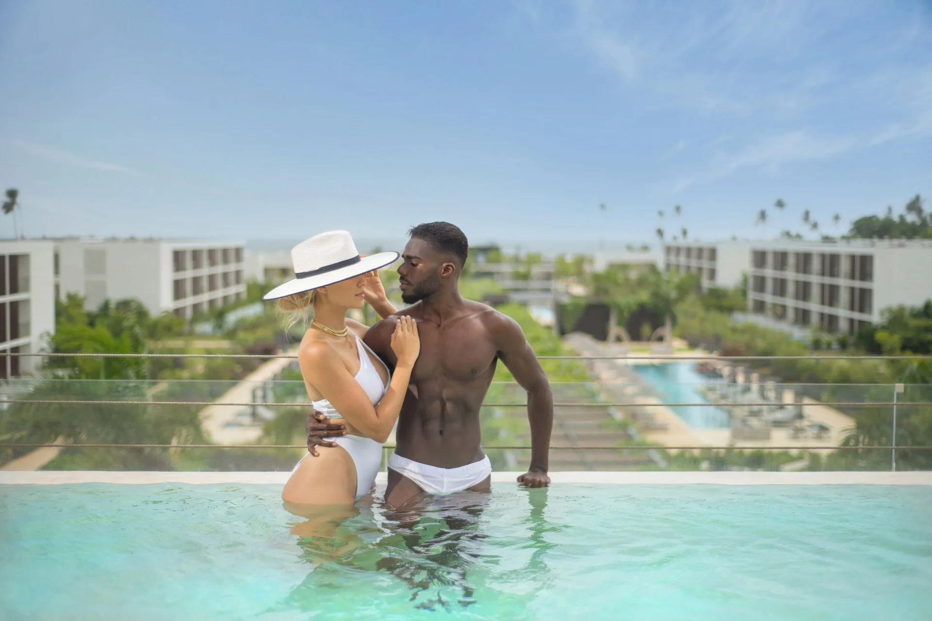 Fuego Suite Ocean View pool with resort and ocean backdrop at Live Aqua Punta Cana.