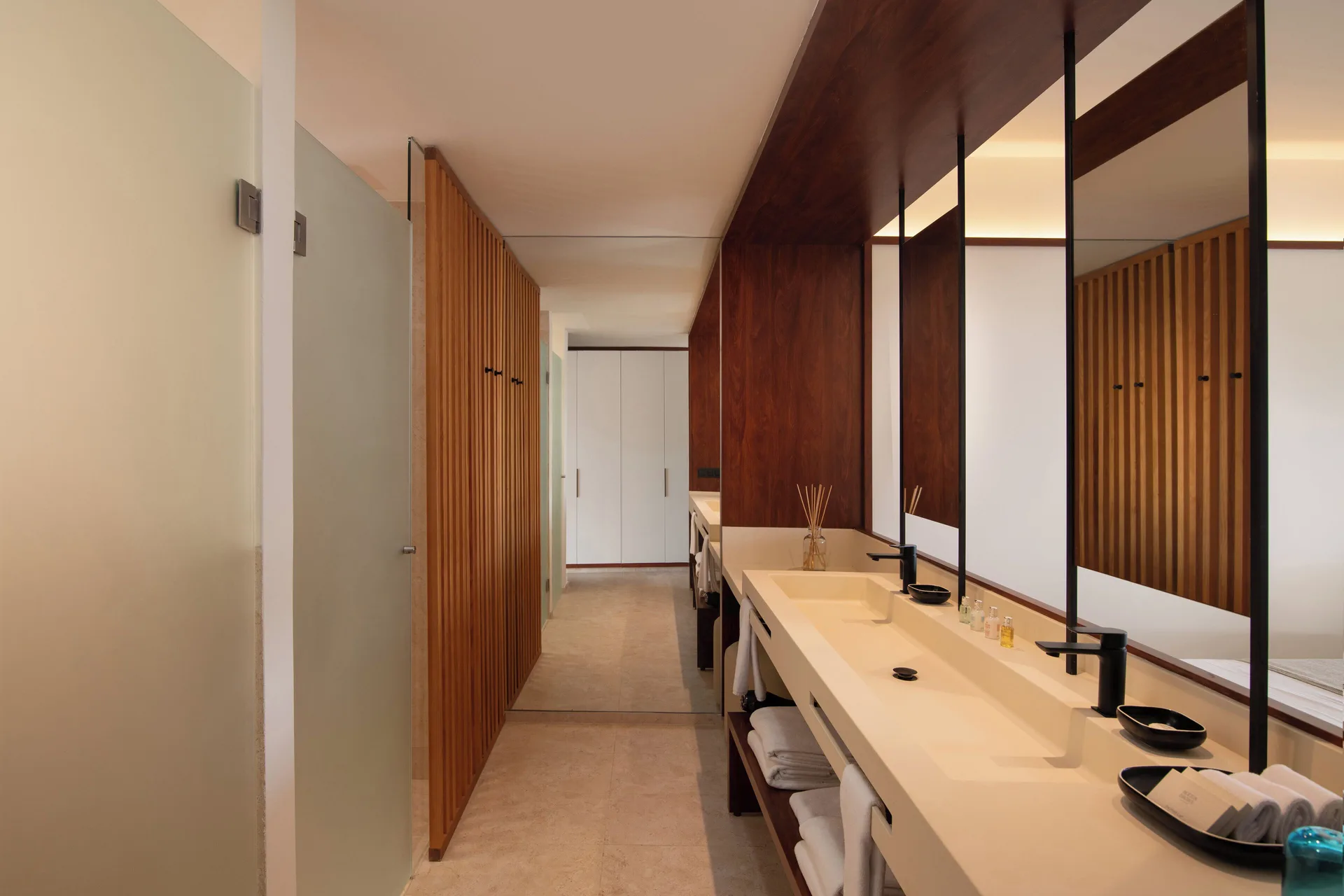 Double vanity bathroom in a Junior Suite Deluxe Pool View at Live Aqua Punta Cana.