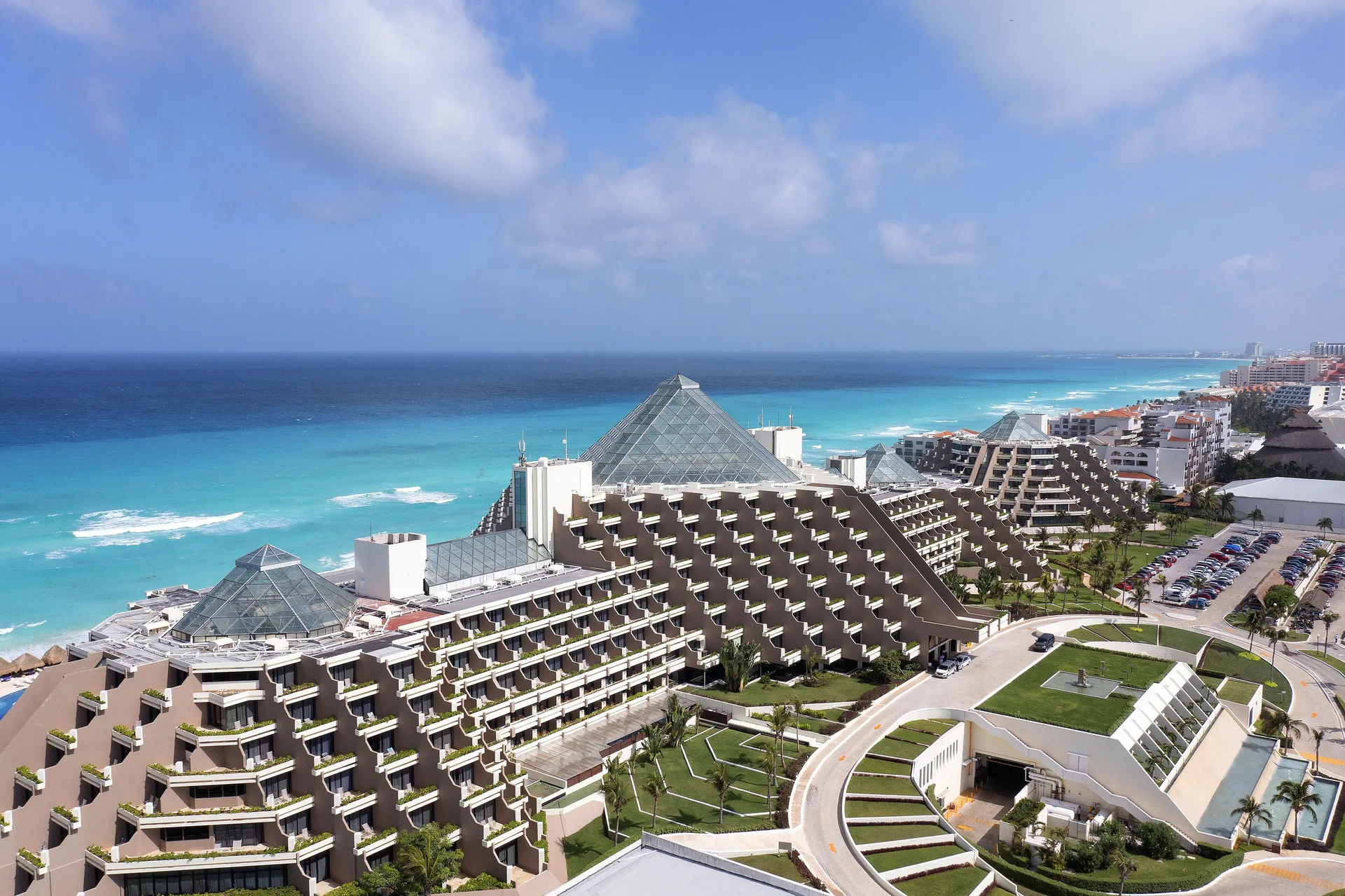 Paradisus Cancún luxury all-inclusive resort with beachfront pools and lush tropical grounds in Cancun's Hotel Zone.