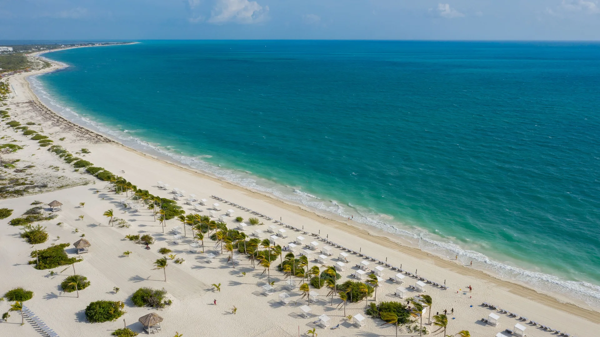 Aerial view of the beach and turquoise coastline at Majestic Elegance Costa Mujeres.