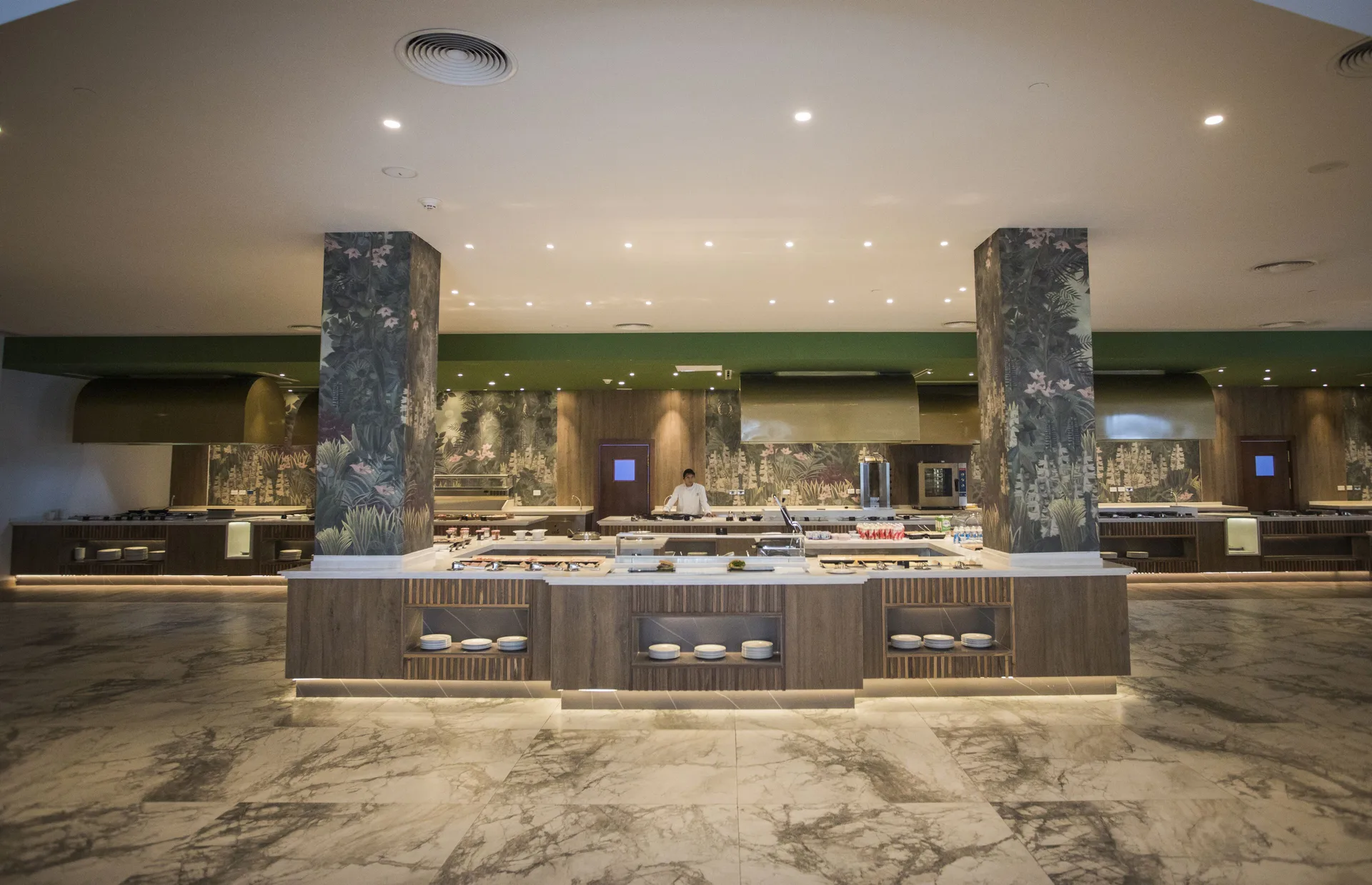 Buffet service area with marble floors at Majestic Elegance Costa Mujeres.