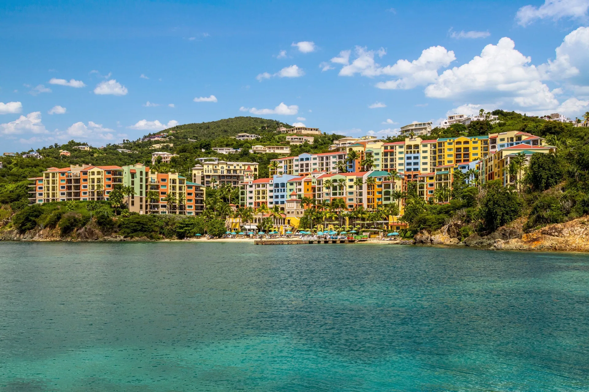 Marriott's Frenchman's Cove villa resort in St. Thomas with hillside views, beach, and spacious suites