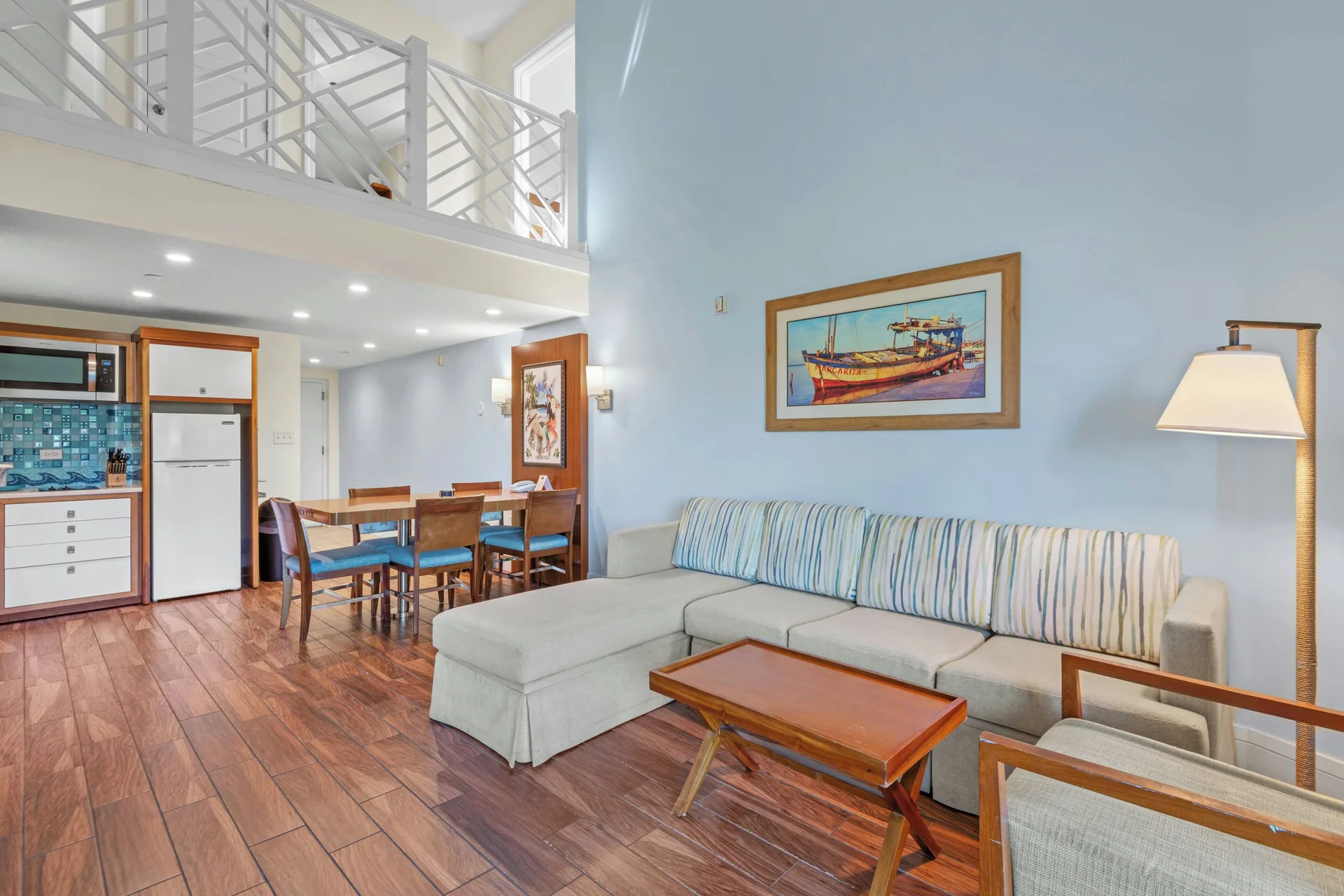 Lofted two-bedroom condo living area at Margaritaville Vacation Club - St. Thomas.