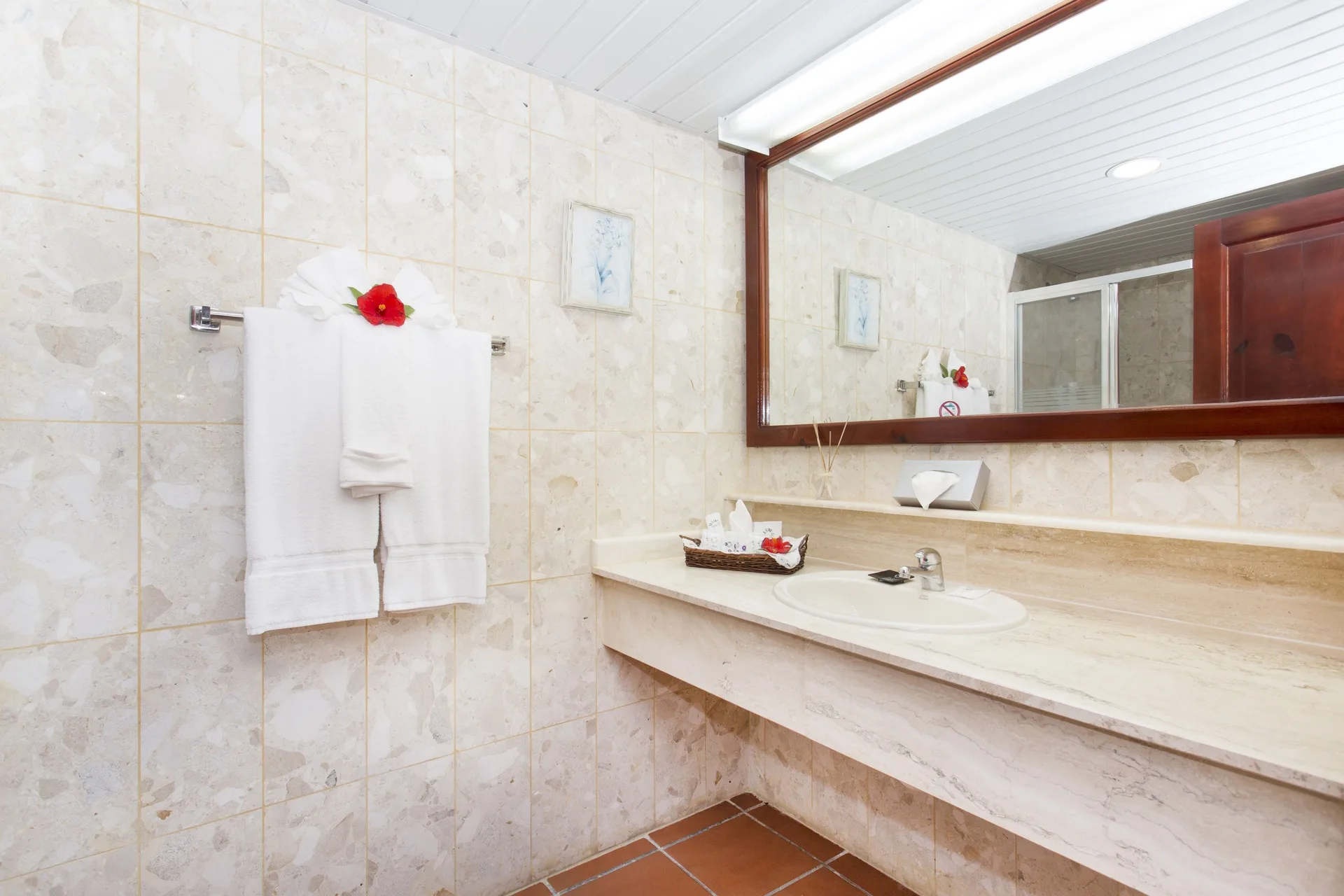 Deluxe Room Garden View bathroom vanity and towels at Marien Puerto Plata.
