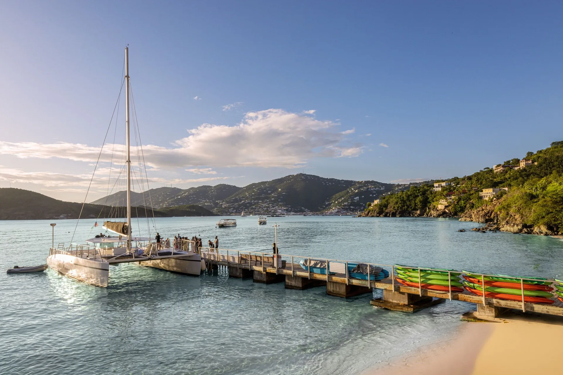 Beach pier with a catamaran and kayaks at Marriott's Frenchman's Cove.