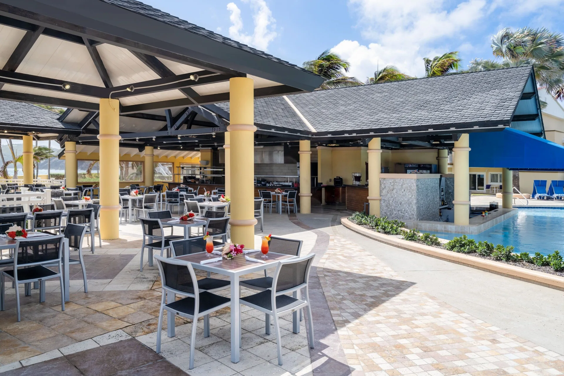 Poolside open-air dining area at Marriott's St. Kitts Beach Club.