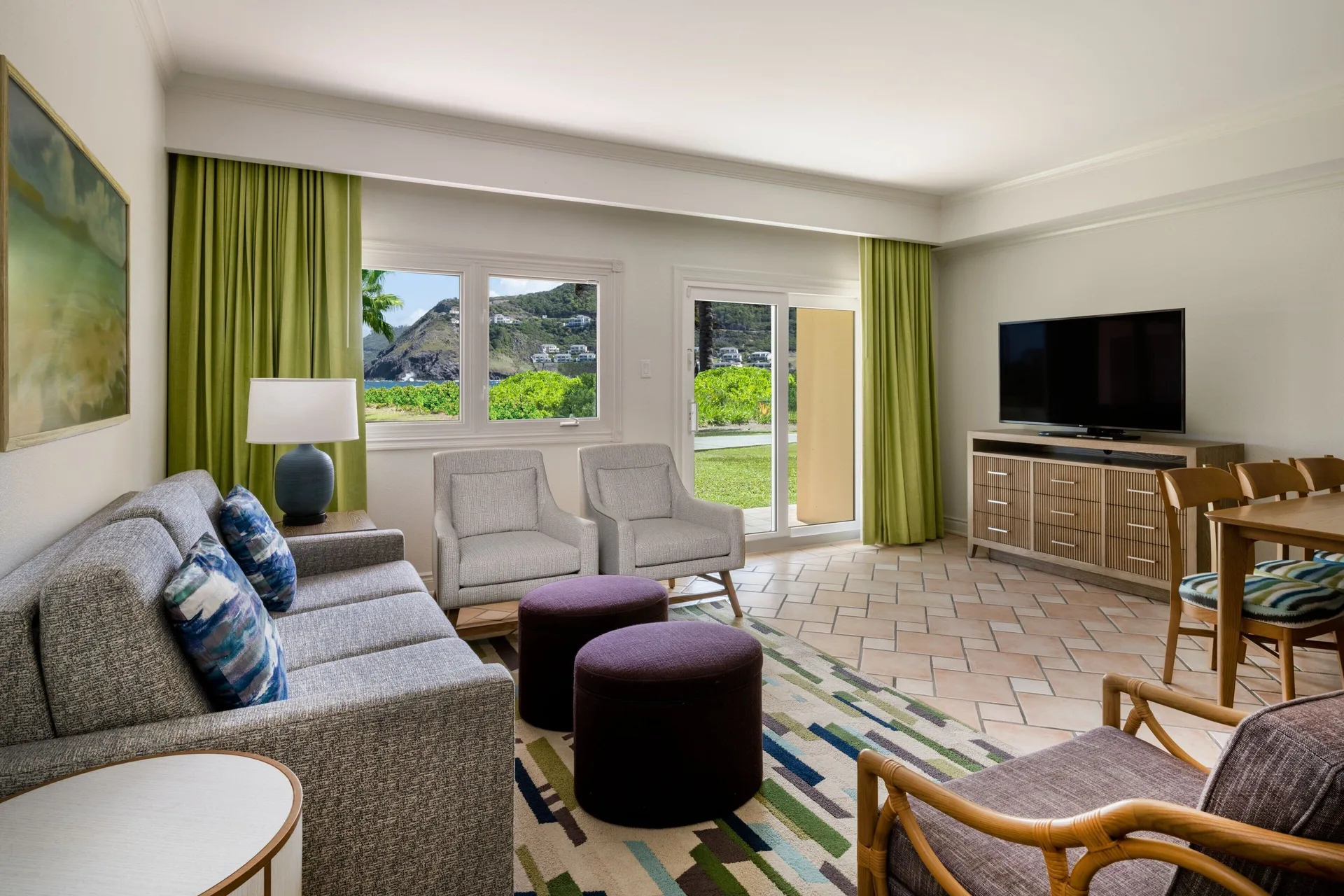 Living and dining area in a garden view villa at Marriott's St. Kitts Beach Club.