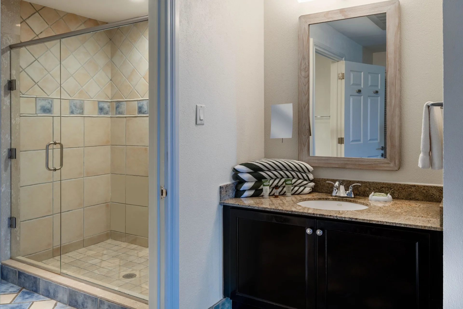 Villa three-bedroom bathroom with tiled glass shower at Marriott's St. Kitts Beach Club.