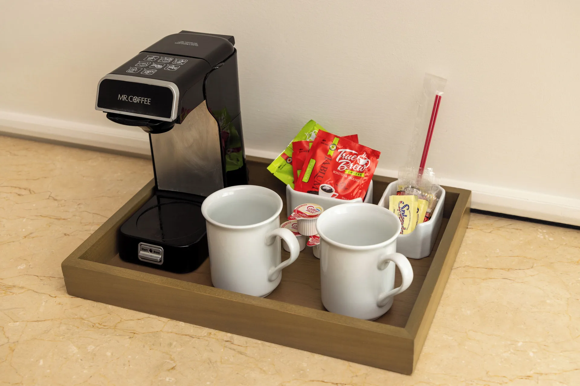 Guest room coffee station with mugs and supplies at Moon Palace Jamaica.