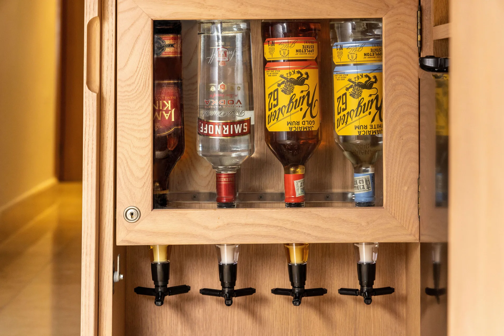 Guest room liquor dispenser cabinet at Moon Palace Jamaica.