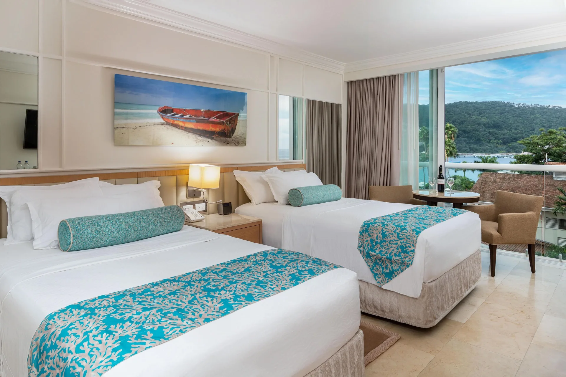Deluxe Resort View with two beds and balcony at Moon Palace Jamaica in Ocho Rios, Jamaica.