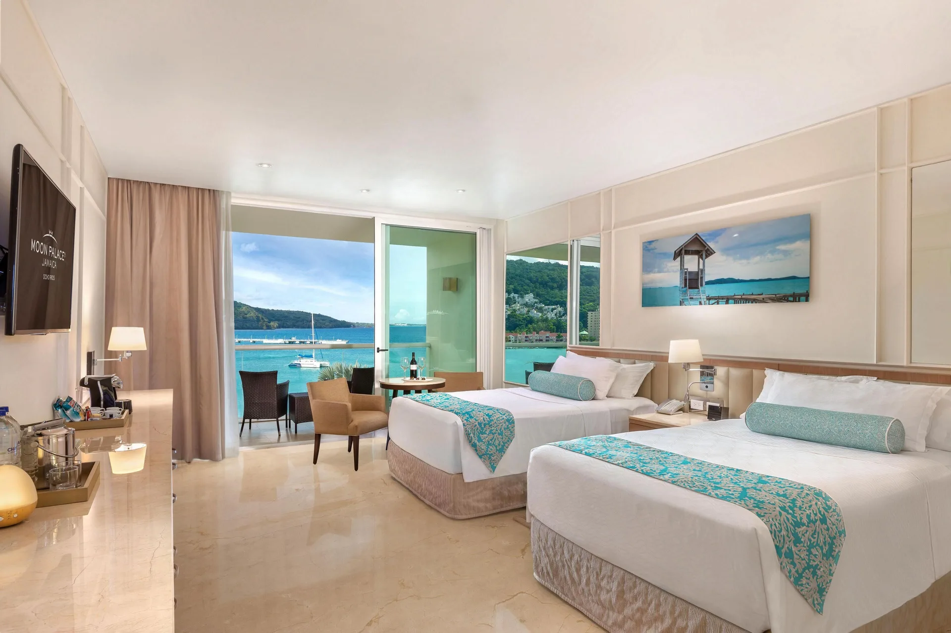 Superior Junior Suite Ocean View two beds and balcony at Moon Palace Jamaica.