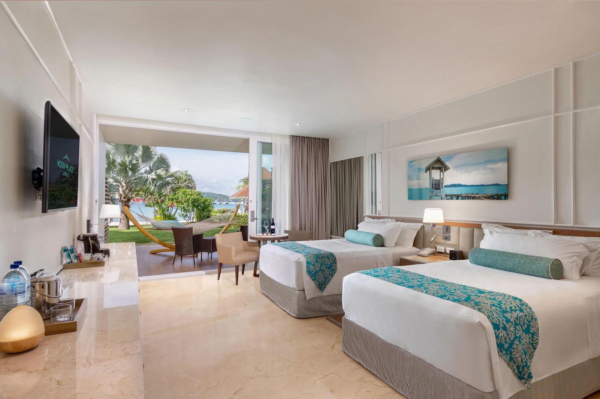 Superior Walk Out Suite Ocean View two beds and walk-out patio at Moon Palace Jamaica.