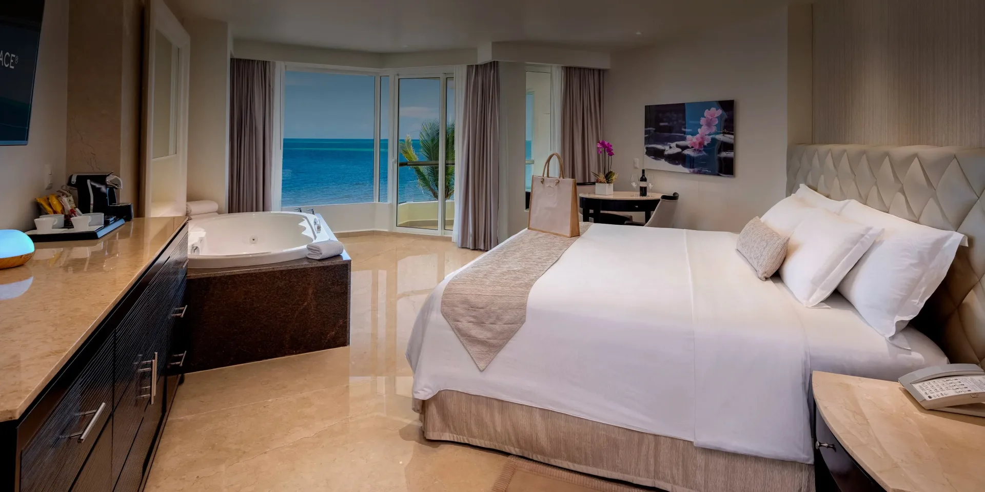 Premium Room with king bed, in-room tub, and ocean-facing windows at Moon Palace.