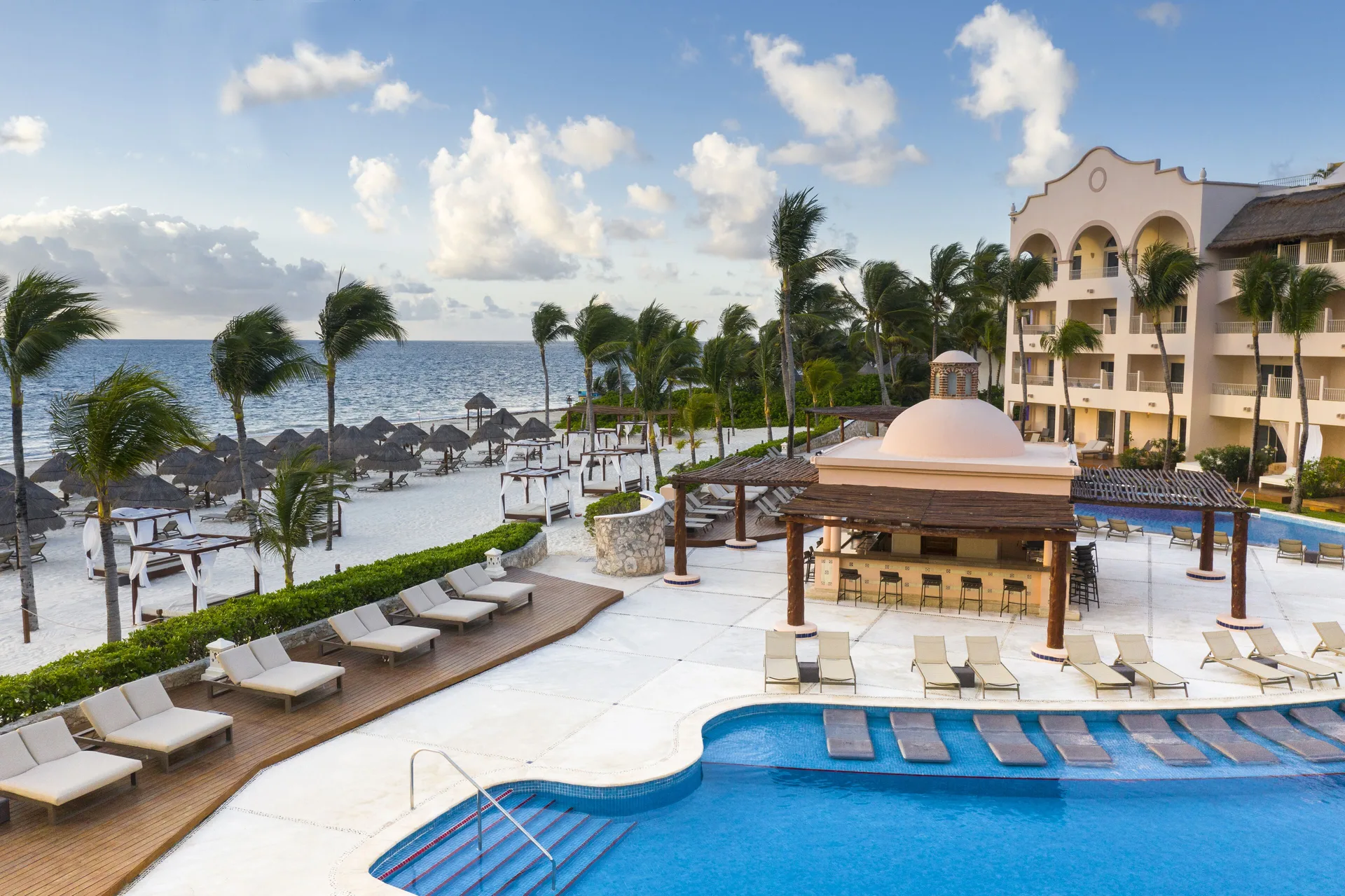 Excellence Riviera Cancun adults-only all-inclusive resort with beachfront pools, suites, and romantic atmosphere