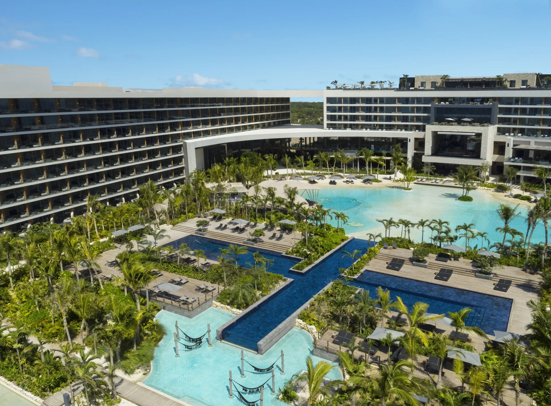 Secrets Moxché Playa del Carmen adults-only all-inclusive resort with lagoon pools and upscale design