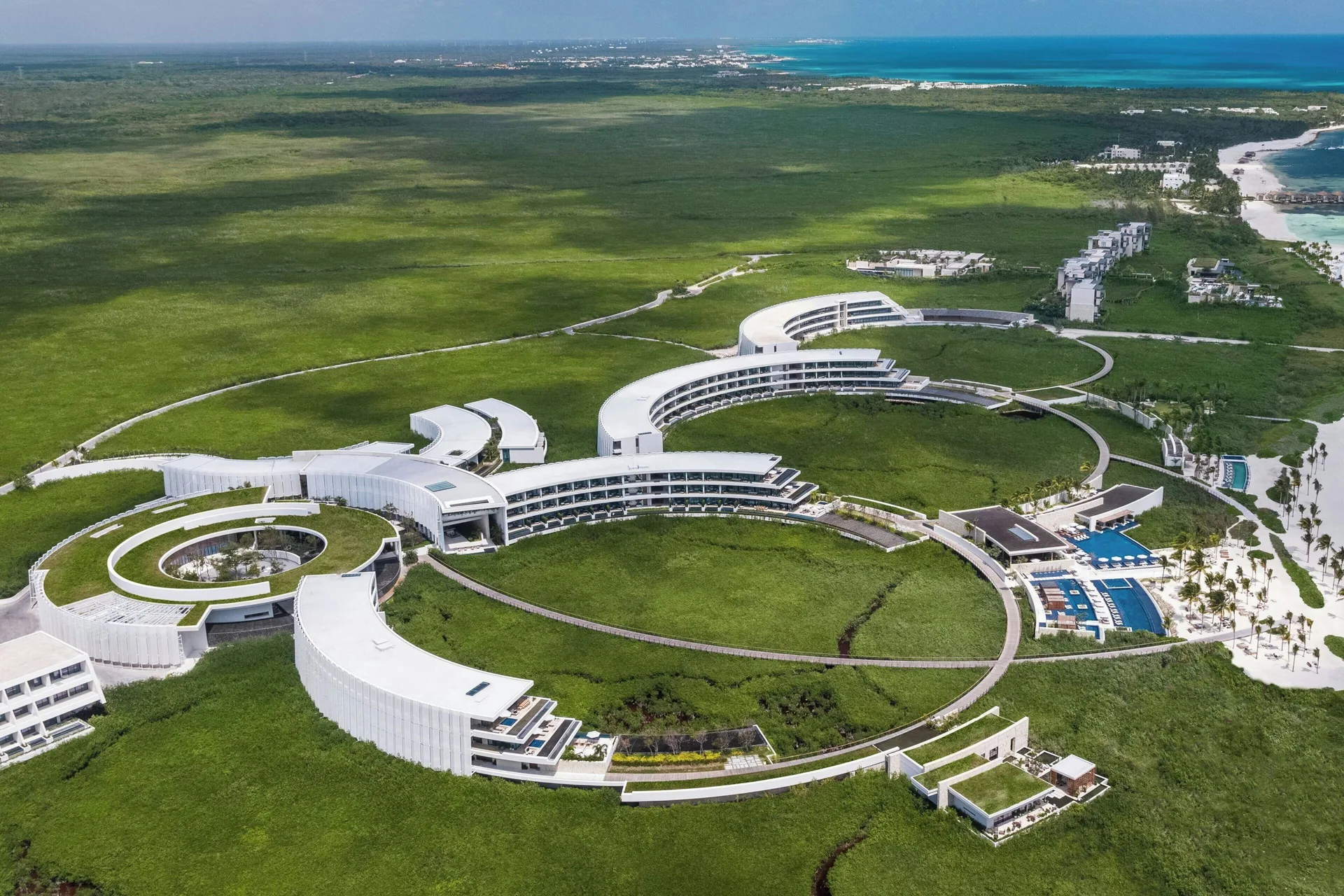 The St. Regis Kanai Resort Riviera Maya luxury beachfront resort with modern architecture and butler service