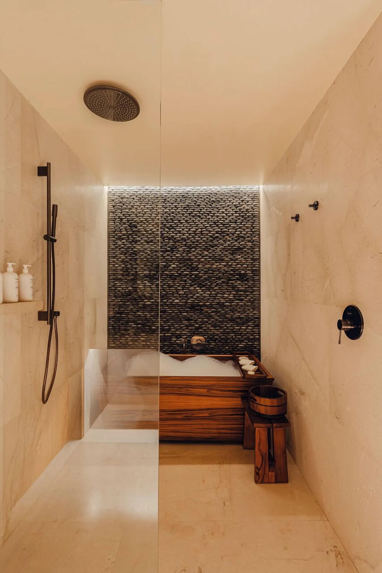 Hikari One Bedroom bathroom with shower and soaking tub at Nobu Hotel Los Cabos.