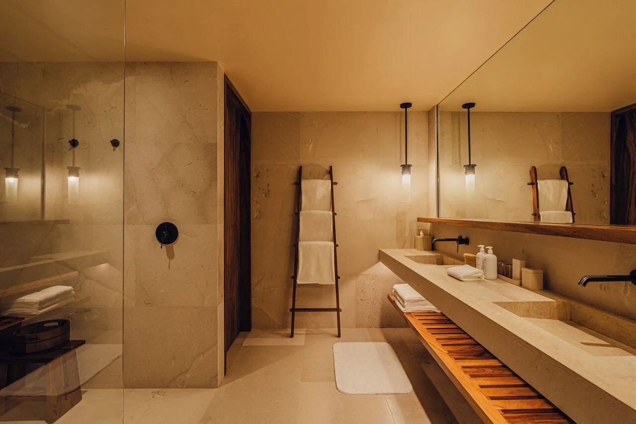 Hikari One Bedroom at Nobu Hotel Los Cabos bathroom vanity and shower at Nobu Hotel Los Cabos.
