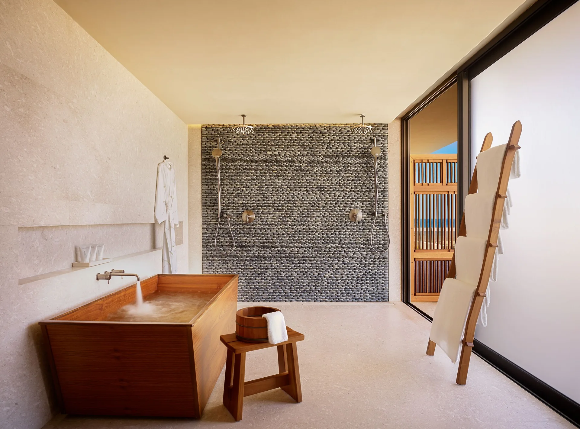 Soaking tub and showers in a Junior Room, Ocean View at Nobu Hotel Los Cabos.