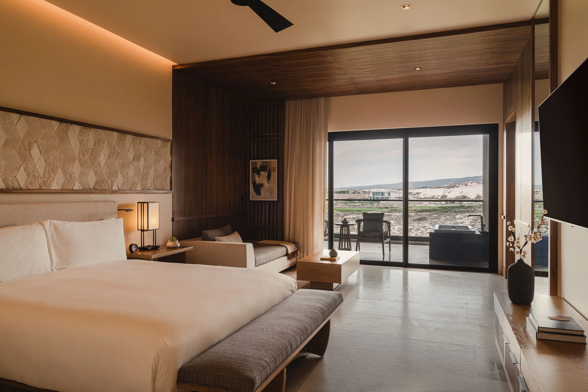 Kogane Penthouse bedroom with king bed and terrace at Nobu Hotel Los Cabos.