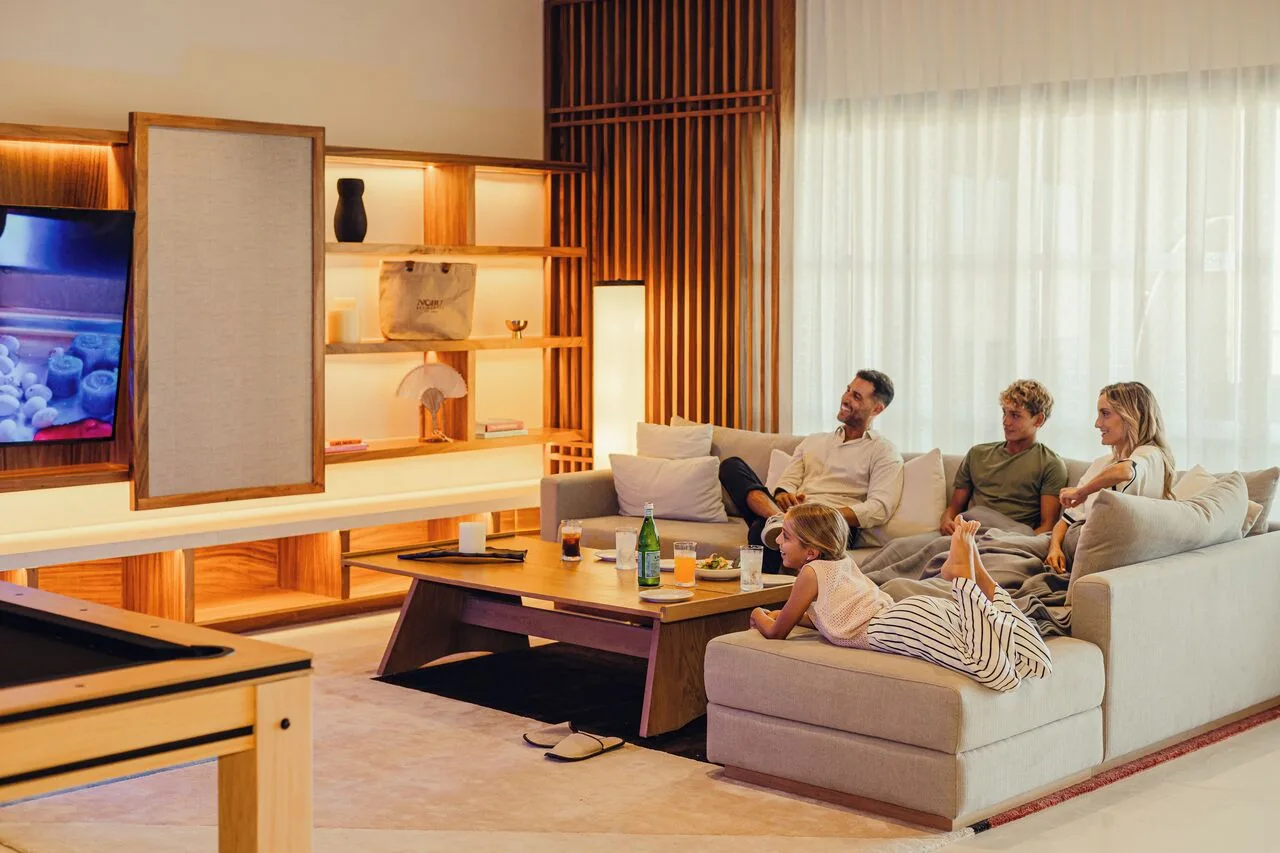 Kogane Penthouse living room with sofa seating and media wall at Nobu Hotel Los Cabos.