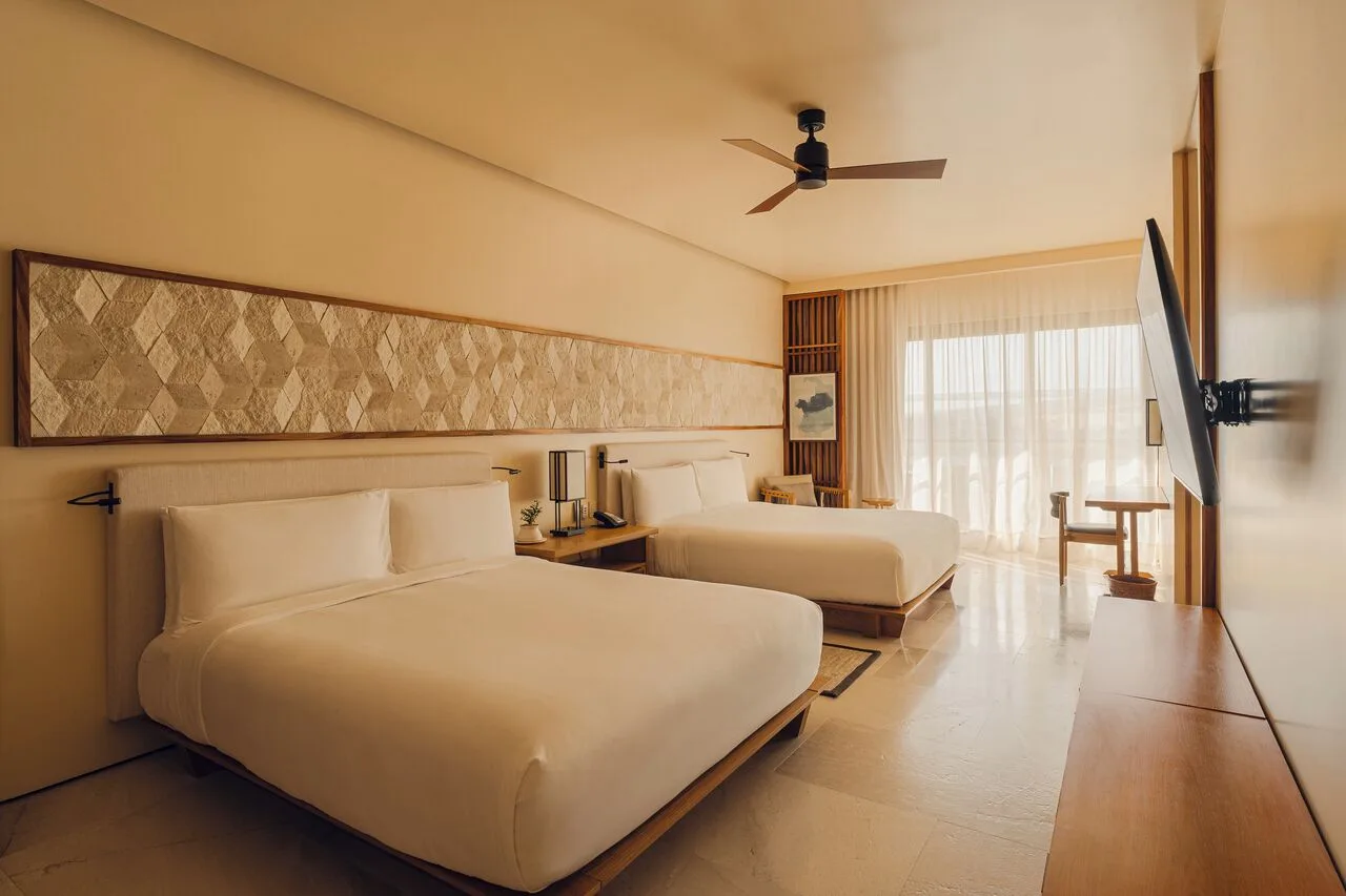 Kogane Penthouse bedroom with two queen beds at Nobu Hotel Los Cabos.