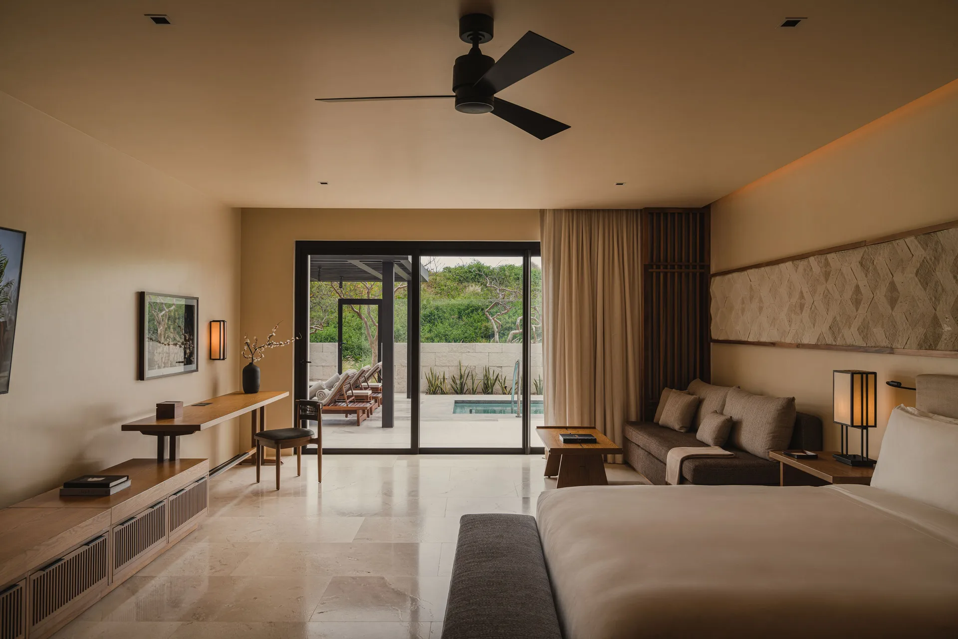 Sakyu 3 Bedrooms guest room with king bed and terrace at Nobu Hotel Los Cabos.