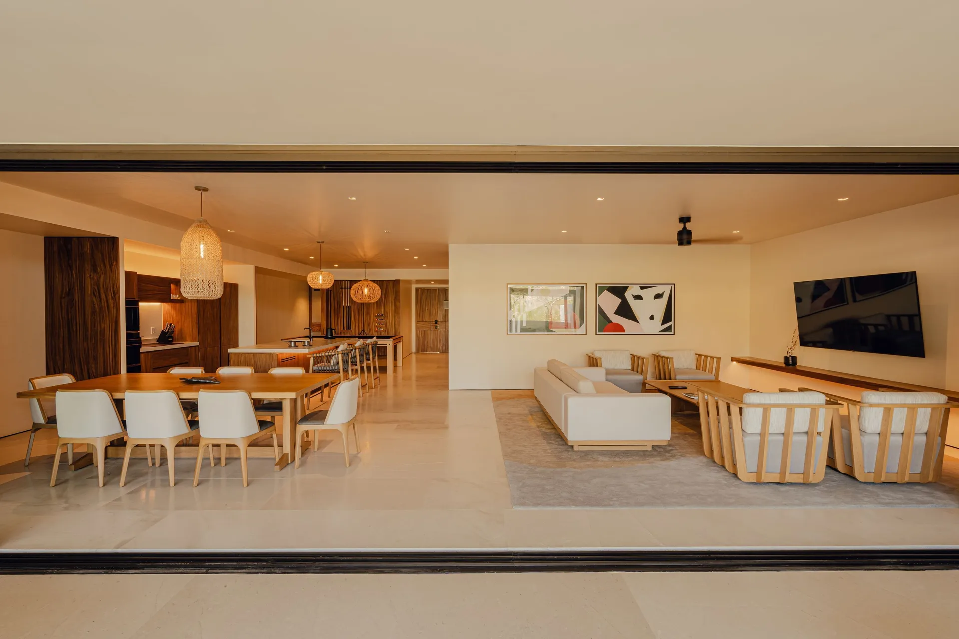 Sakyu 3 Bedrooms interior seen through wide terrace doors at Nobu Hotel Los Cabos.