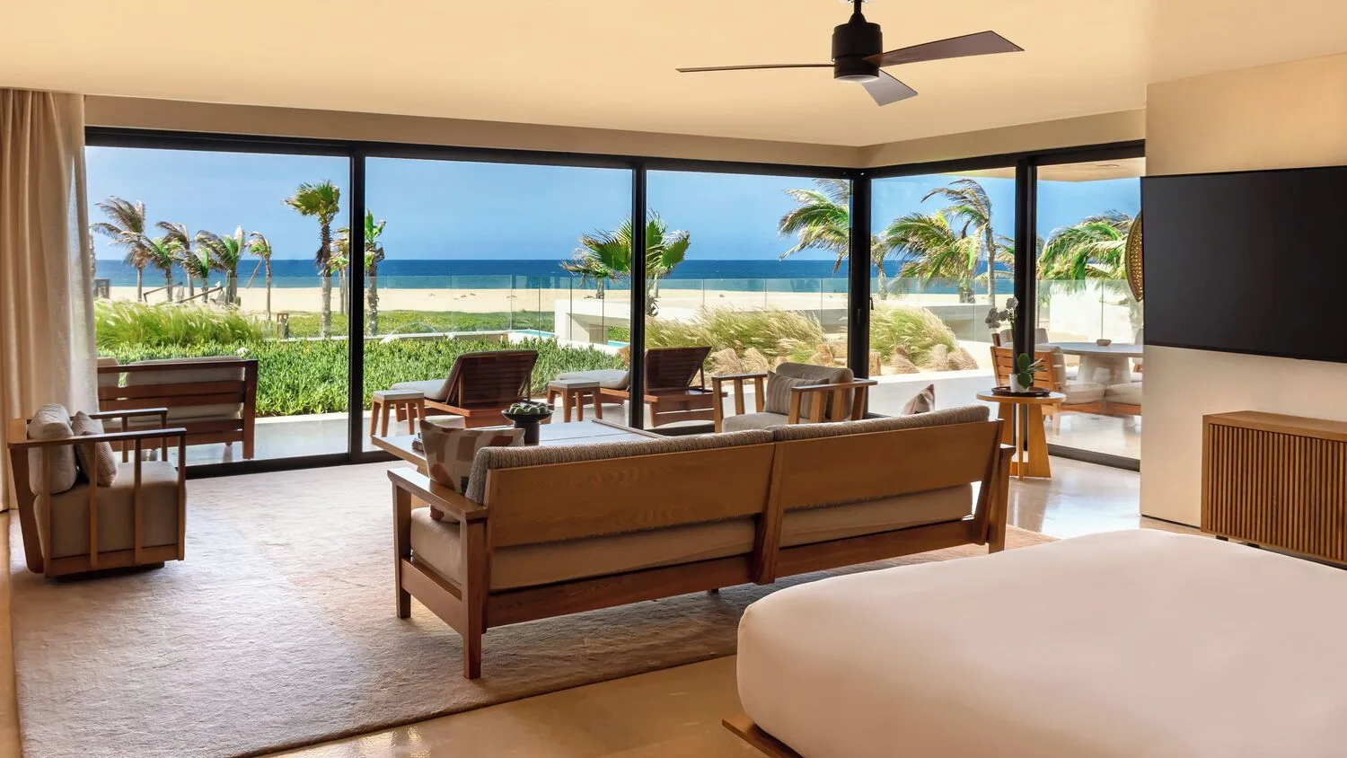Suite Ocean View bedroom and terrace facing the ocean at Nobu Hotel Los Cabos.