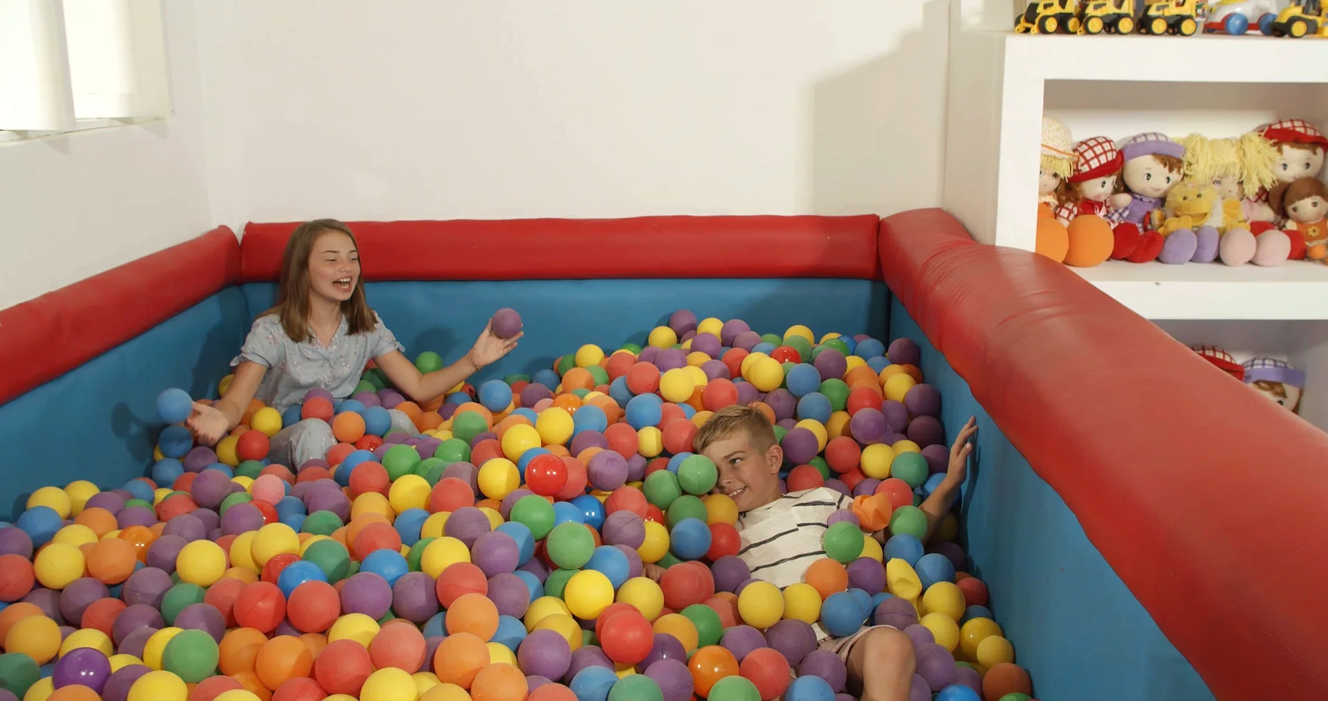 Children play in a colorful ball pit at Occidental Punta Cana.