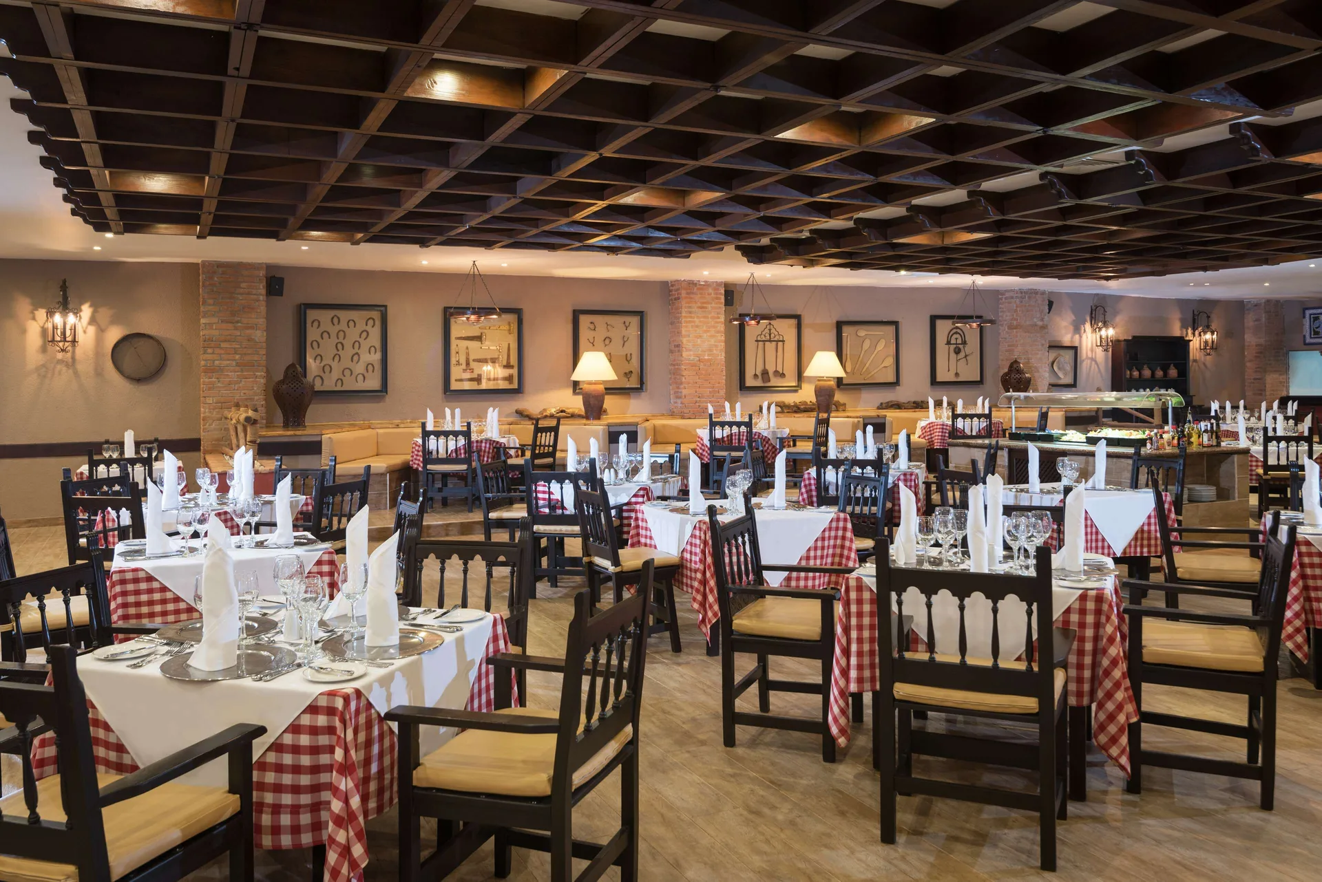 Italian-style dining room with checkered tablecloths at Occidental Punta Cana.